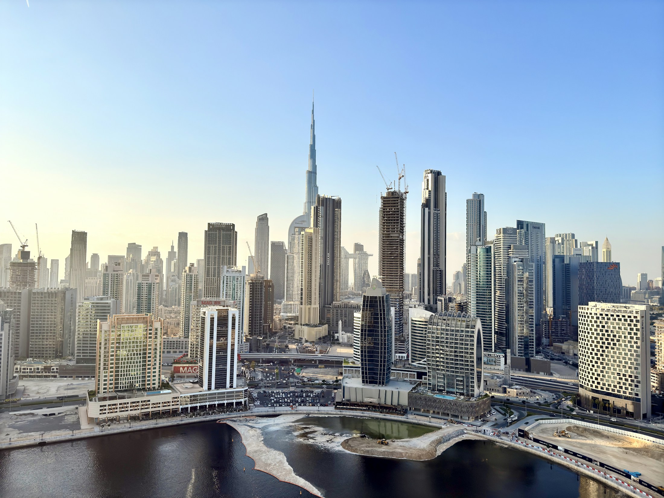 Dubai business skyline and Burj Khalifa in bright daylight