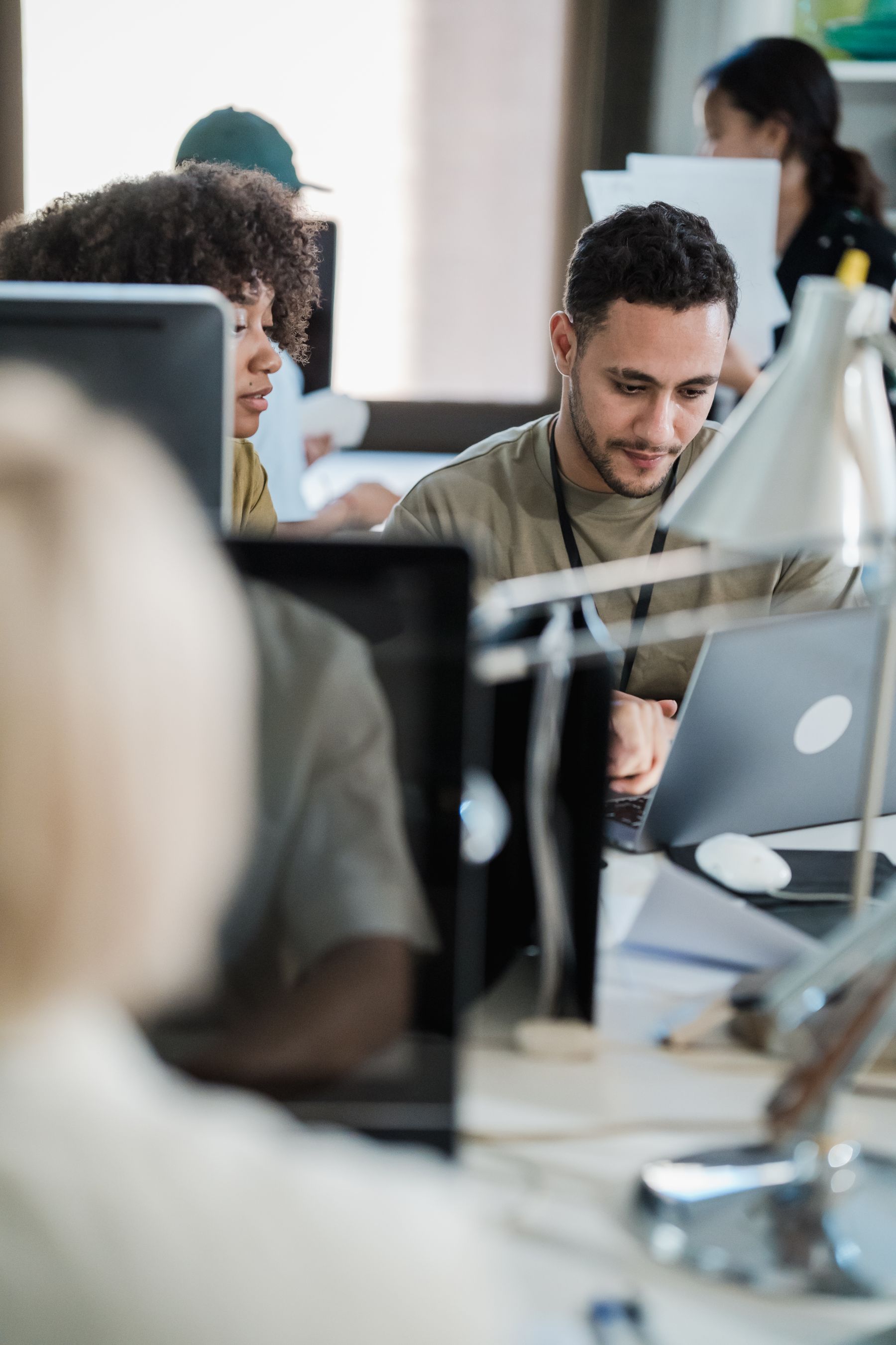 Professionals collaborating in a modern office